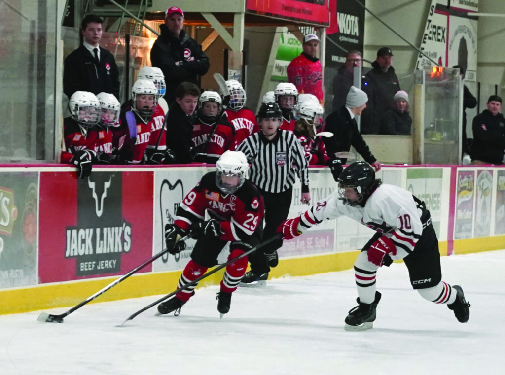 Mike Carroll/Plainsman
Huron’s William Mattke pressures Yankton’s Brecken Weber during their semi-final game Saturday at Bergman Arena. 