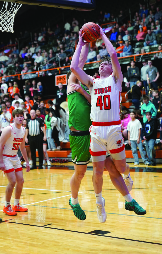 MIKE CARROLL/PLAINSMAN
Huron’s Davis Chase puts up a shot during the second half of a game against Pierre on Tuesday at Huron Arena.