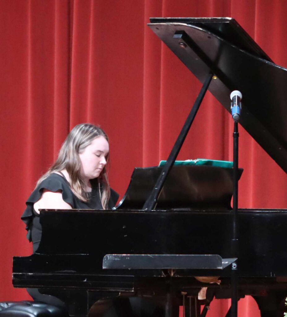 Benjamin Chase/Plainsman
Hailey Schoenfelder, who was the first to tickle the ivories Tuesday, playing “How Great Thou Art.”