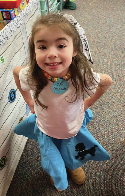 Preschooler Ivy Prondzinski all dressed up in her poodle skirt.
