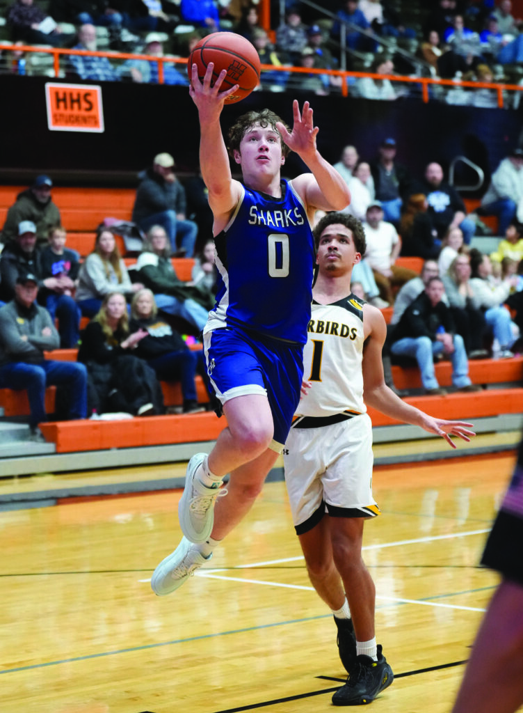 Photo Courtesy Craig Wollman Lucas Peskey of Peskey of Iroquois/Lake Preston puts up a shot during a 281 Conference Tournament game on Jan. 22 at Huron Arena.