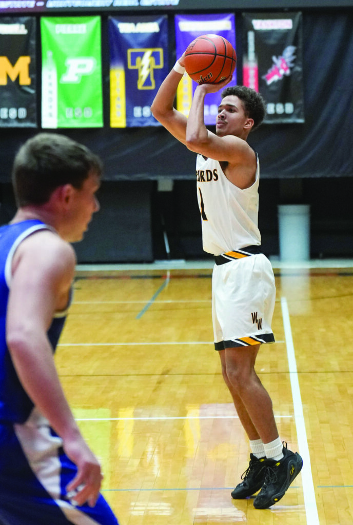 Wolsey-Wessington’s Caleb Richmond puts up a shot during a 281 Conference Tournament game on Jan. 22 at Huron Arena. (photo courtesy of Craig Wollman)