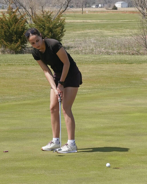 Mike Carroll/Plainsman Kaihlyn Anderberg of Miller putts during the Huron Quadrangular held Tuesday at Broadland Creek Golf Course.