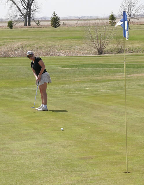 MIKE CARROLL/PLAINSMAN Jayce Pugh of Miller putts during the Huron Quadrangular on Tuesday at Broadland Creek Golf Course.