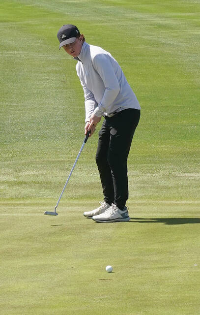Mike Carroll/Plainsman JD Thompson of Wessington Springs watches his putt on the No. 18 green approach the hole during the Wolsey-Wessington Invite on Friday at Broadland Creek Golf Course.