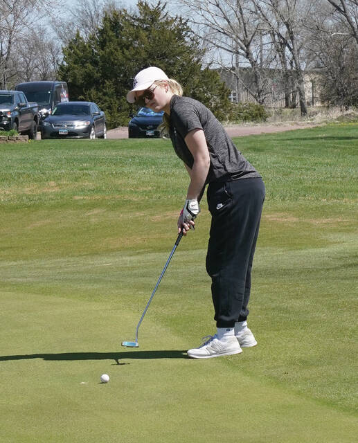 Mike Carroll/Plainsman Jaylyn Grassel of Sanborn Central/Woonsocket closes her round with a putt on the No. 9 green during the Wolsey-Wessington Invite on Friday at Broadland Creek Golf Course.