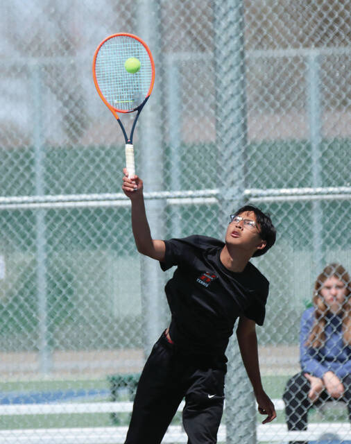 COURTESY OF JOEL BERGESON Hurons Lah Gay Soe plays a shot during a match against Aberdeen Roncalli on Friday at Huron Courts.