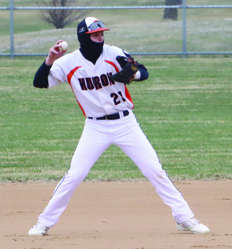 Huron second baseman Colt Culver prepares to throw to first during Saturday’s JV doubleheader against Lincoln at Klock Field.
