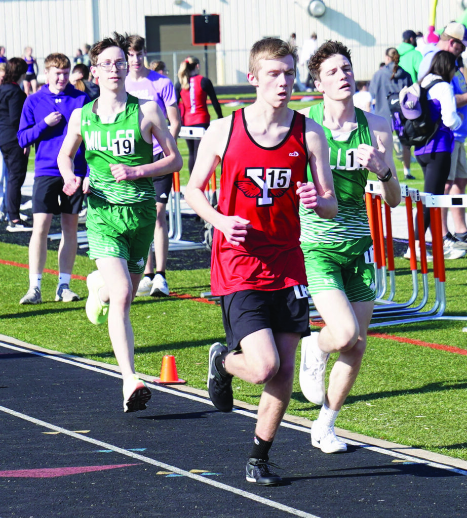 MIKE CARROLL/PLAINSMAN
Miller teammates Jake Gibson and Haistyn Huss, along with Yankton’s Dylan Kirchner compete in the boys’ 1,600-meter race during the Huron Invitational on Friday at Tiger Stadium. 