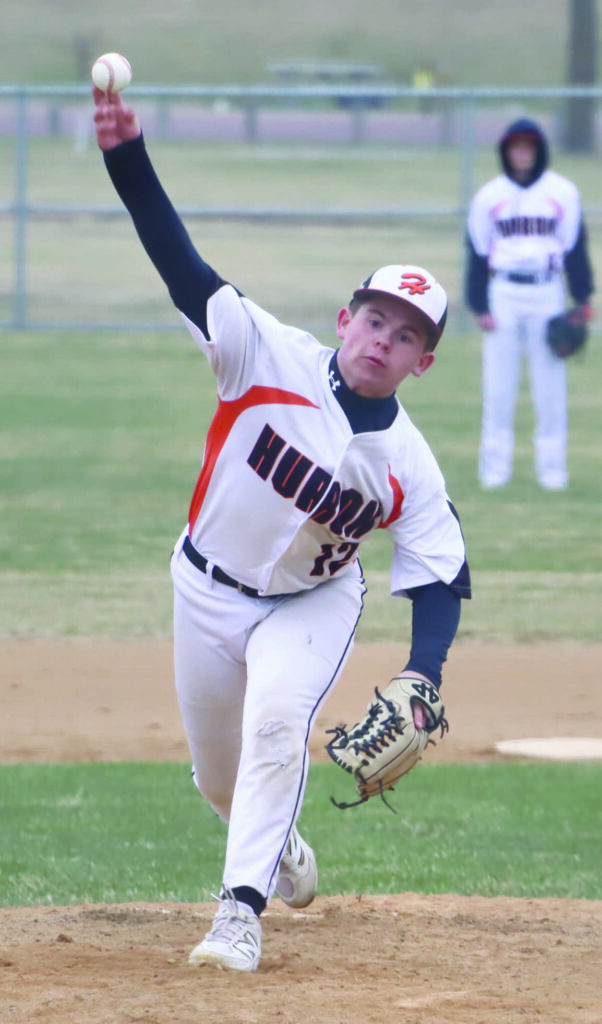 Benjamin Chase/Plainsman Huron’s Parker Bischoff delivers to the plate during the first game of Saturday’s doubleheader at Klock Field.