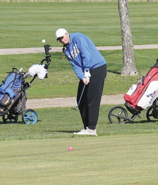 Mike Carroll/Plainsman Kaitlyn Braun of Wessington Springs chips during the 281 Conference Golf Tournament on Thursday at Broadland Creek Golf Course.