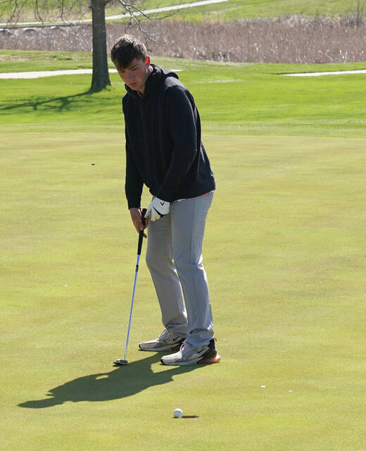Mike Carroll/Plainsman Ben Curd of Iroquois/Lake Preston sinks a putt during the 281 Conference Tournament on Thursday at Broadland Creek Golf Course.