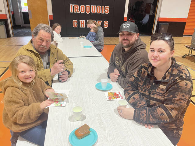 Iroquois first grader Ellianna Blocker attends read n roll with her family.