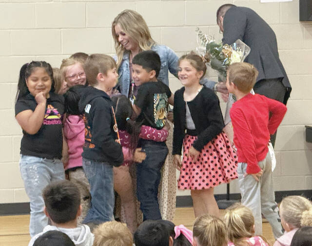 Benjamin Chase/Plainsman Below: After she was done speaking, a number of students got up to hug Mrs. Korkow.
