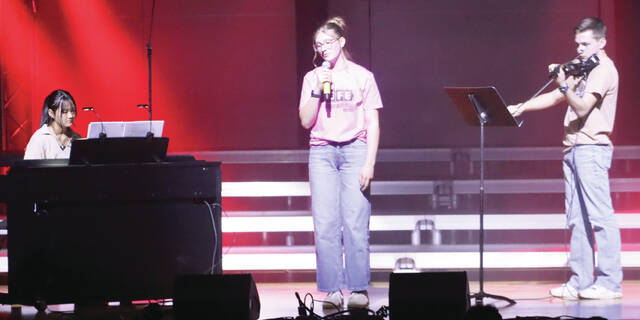 Karly Knippling sings Vienna with Blue Law Shee on piano and Kaden Steinhoff on violin.
                                 Benjamin Chase/Plainsman