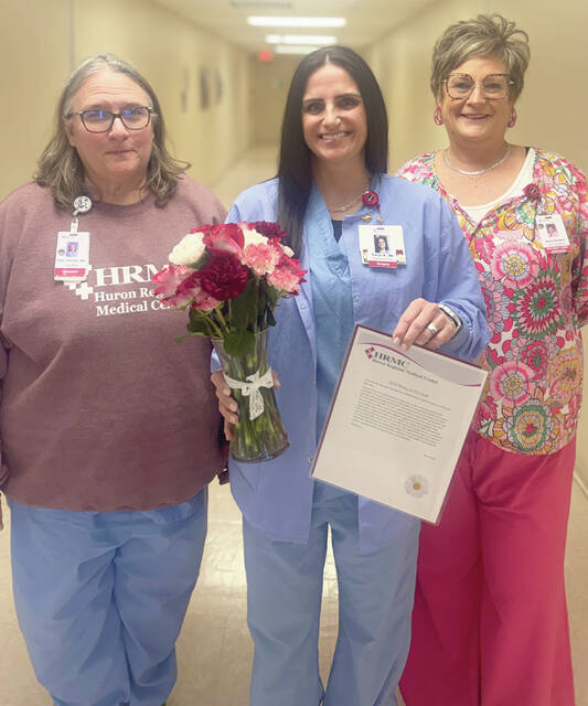 Left to right: Pam Shoultz, director of surgery; Tarryn Korkow, RN and 2026 DAISY Award recipient; and Amy Goergen, vice president of patient services, celebrate Korkows recognition during National Nurses Week.