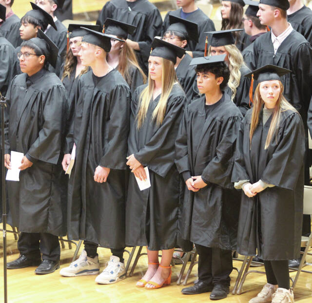 Shaun Sarvis/Plainsman Seniors in their caps and gowns attend the baccalaureate service on Wednesday at Huron Arena.