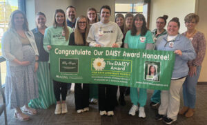 Olinger recognized with DAISY award at HRMC
