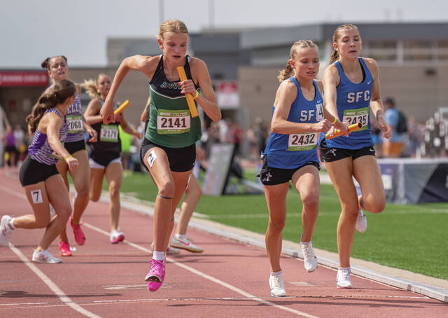COURTESY OF SOUTH DAKOTA PUBLIC BROADCASTING Clark/Willow Lakes Kamryn Nesheim (2141) carries the baton during the medley relay in the Class A State Track and Field Meet on Thursday at Howard Wood Stadium in Sioux Falls.